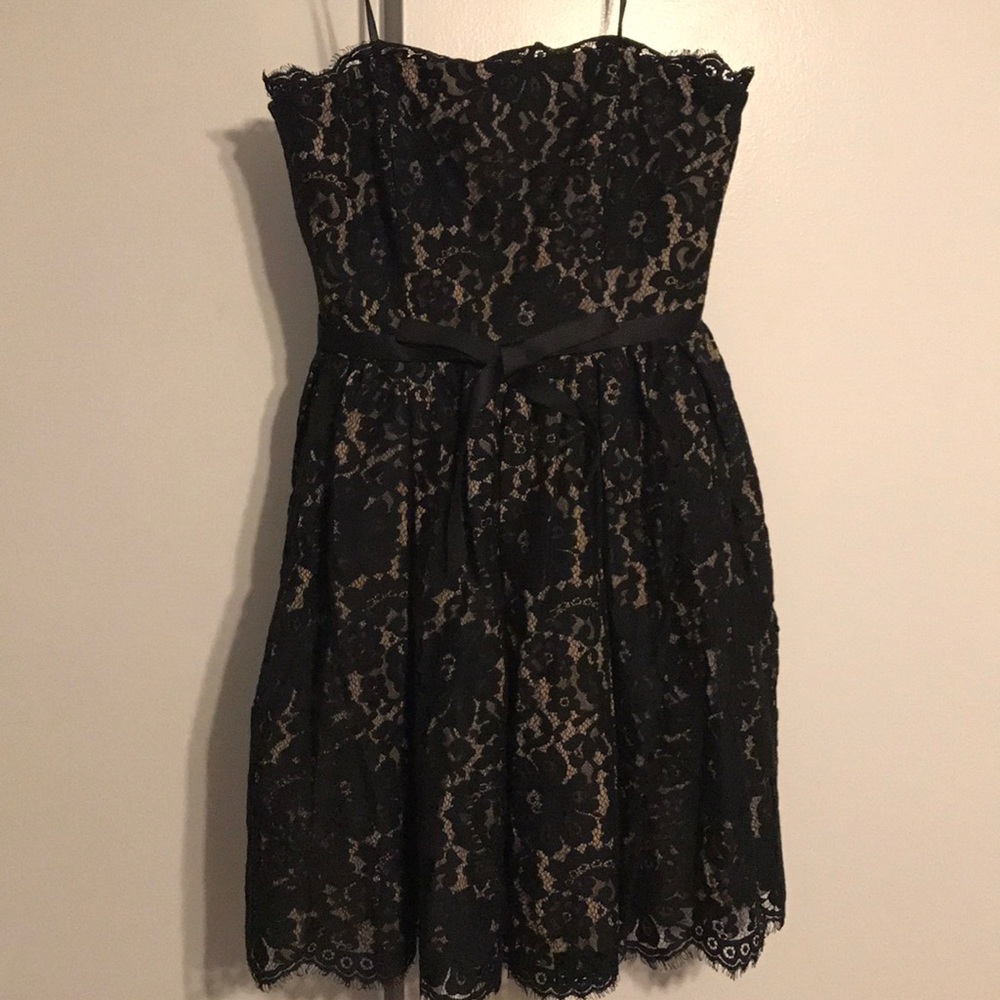Strapless black lace mini dress